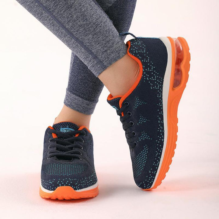 Black women's comfort sneakers, lightweight & breathable with air cushion.