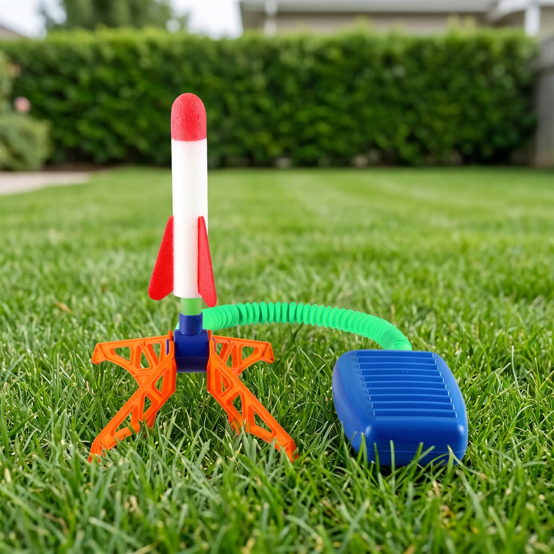 Foot powered air rocket launcher for kids; no batteries needed for exciting outdoor summer fun.