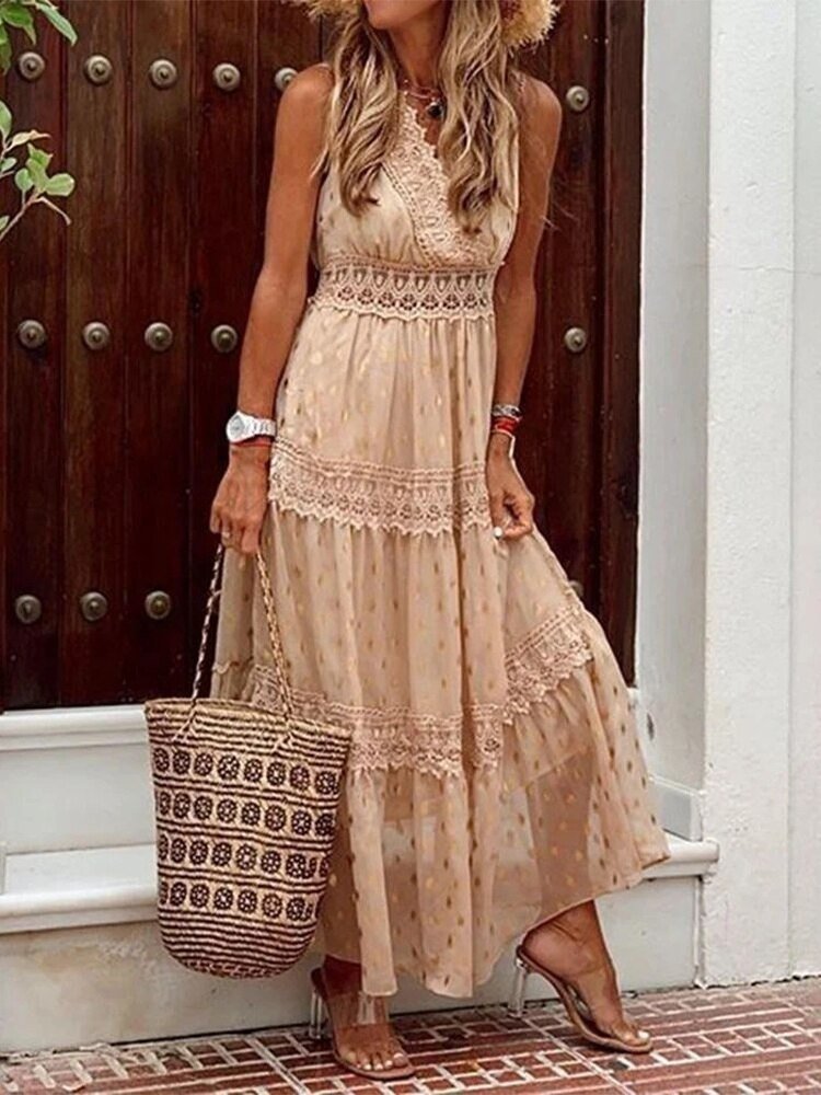 Women's Ibiza style boho summer dress with V-neck, flowy fabric, perfect for beach or casual wear.
