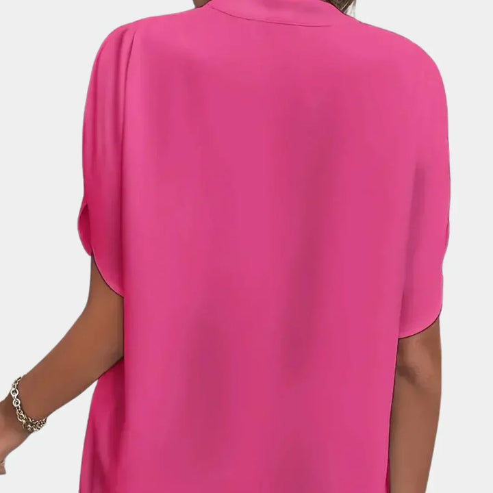 Effortless style with this breezy women's blouse, ideal for warm weather.