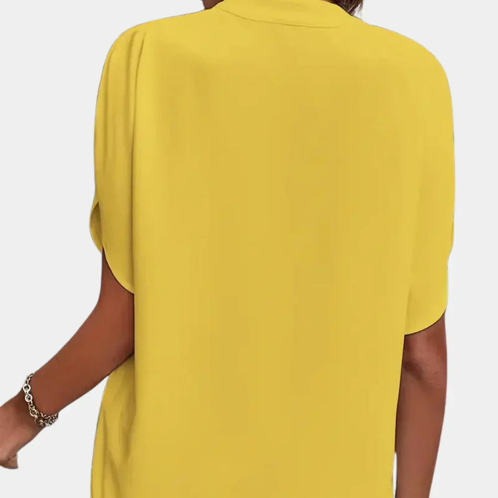 Breezy summer top for women, effortless style, loose fit for warm weather.