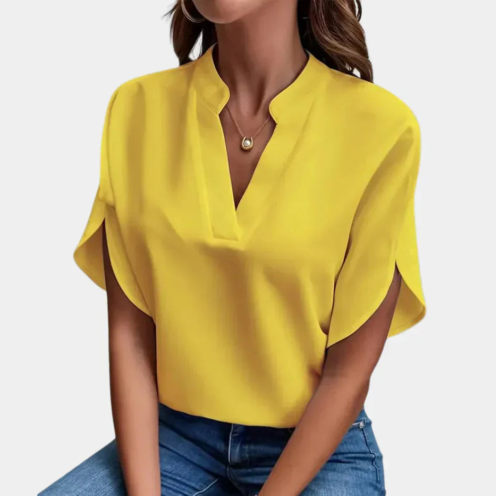 Casual short-sleeve women's top, airy and loose fit, great for vacation.