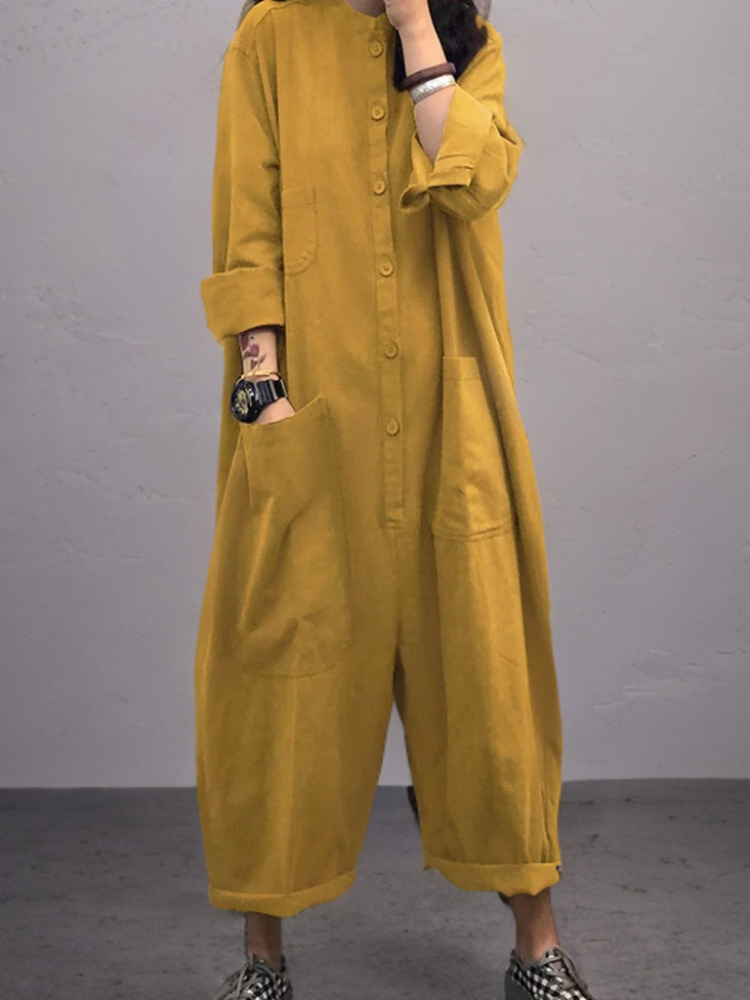 Comfortable women's wide-leg summer jumpsuit with elastic waist, V-neck, & pockets. Perfect for relaxed holiday fashion.