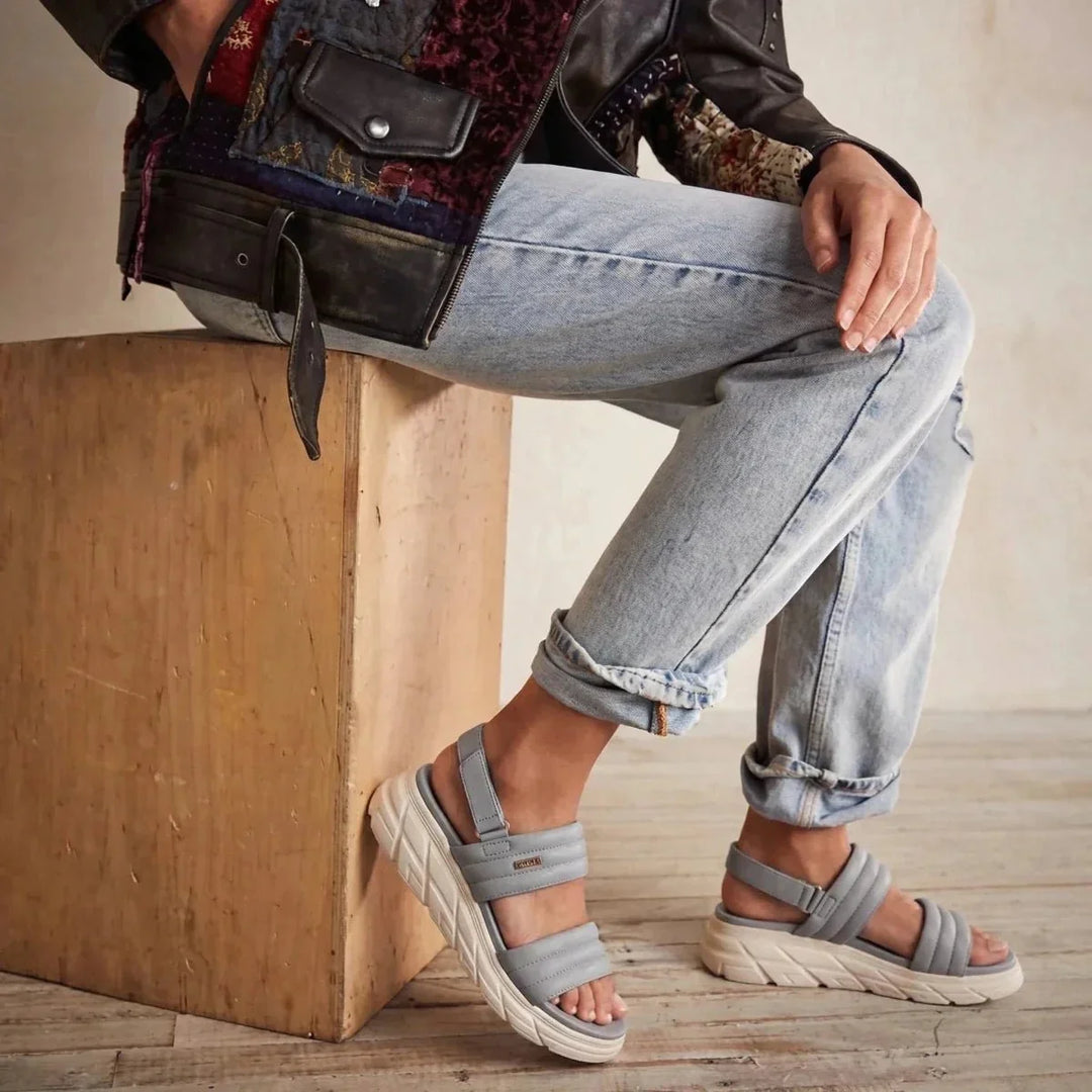 Women's orthopedic slip-on sandals, providing arch support for comfortable walking.