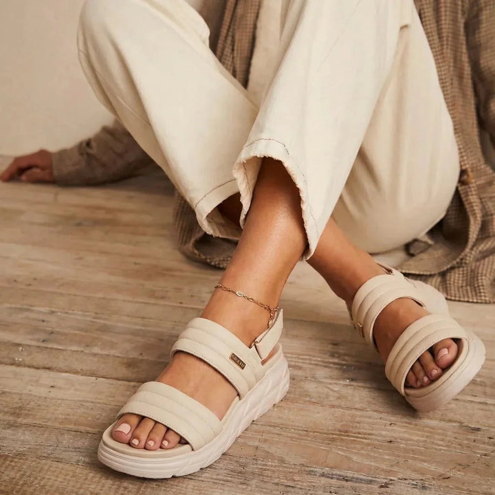 Ergonomic women's sandals, offering comfortable arch support for long wear.