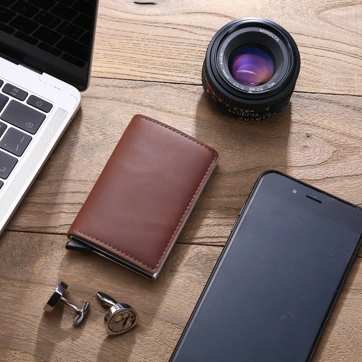 Modern metallic gray aluminum cardholder wallet, ideal for slim front pocket carry.