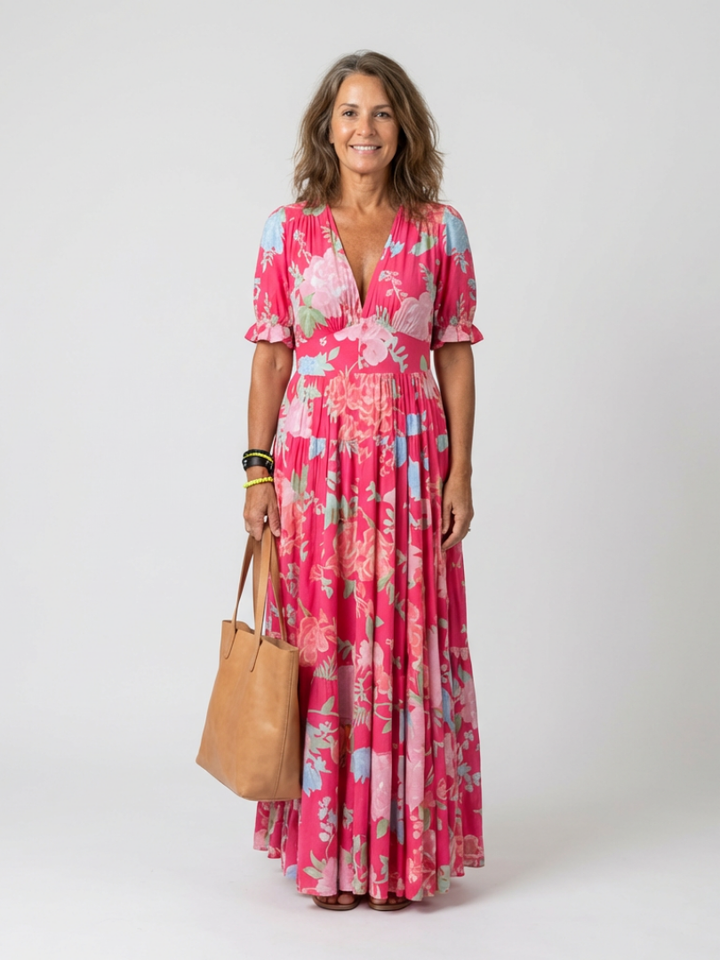 Elegant floral V-neck maxi dress with flutter sleeves, perfect for wedding guests or summer parties.