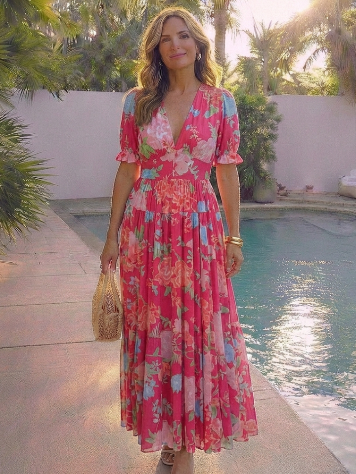 Chic women's V-neck floral maxi dress, perfect as wedding guest attire or an elegant summer party dress.