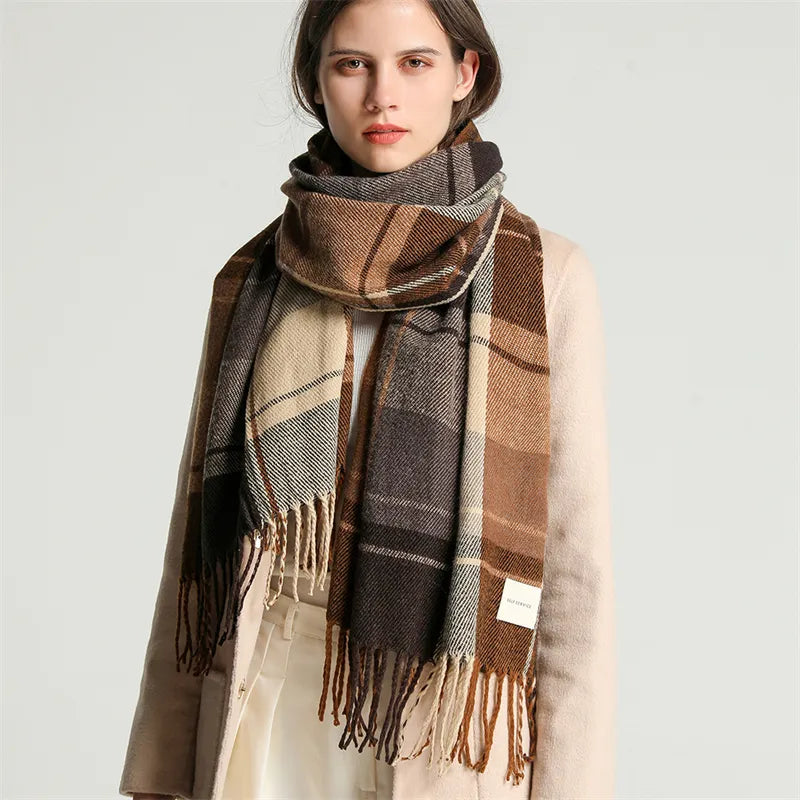 Detailed view of a women's checkered knitted scarf with an intricate pattern, soft texture, and tassels.