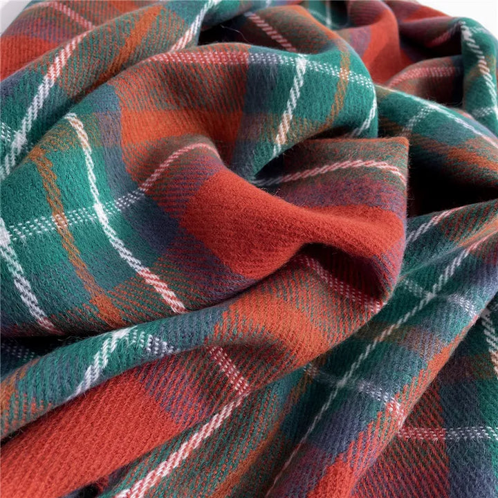 Cozy women's checkered knitted scarf, perfect for adding a trendy touch to any winter ensemble.