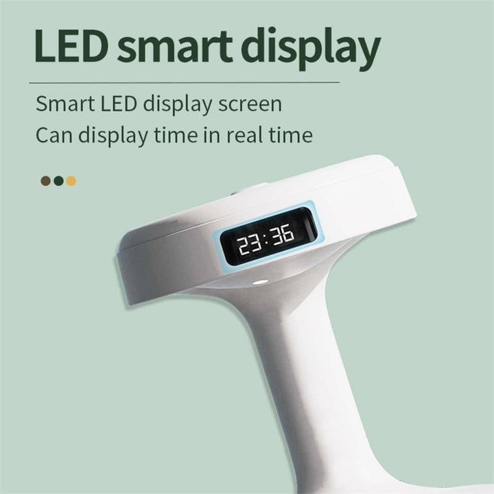 Stylish anti-gravity desktop humidifier with a glowing LED light & functional digital clock display.