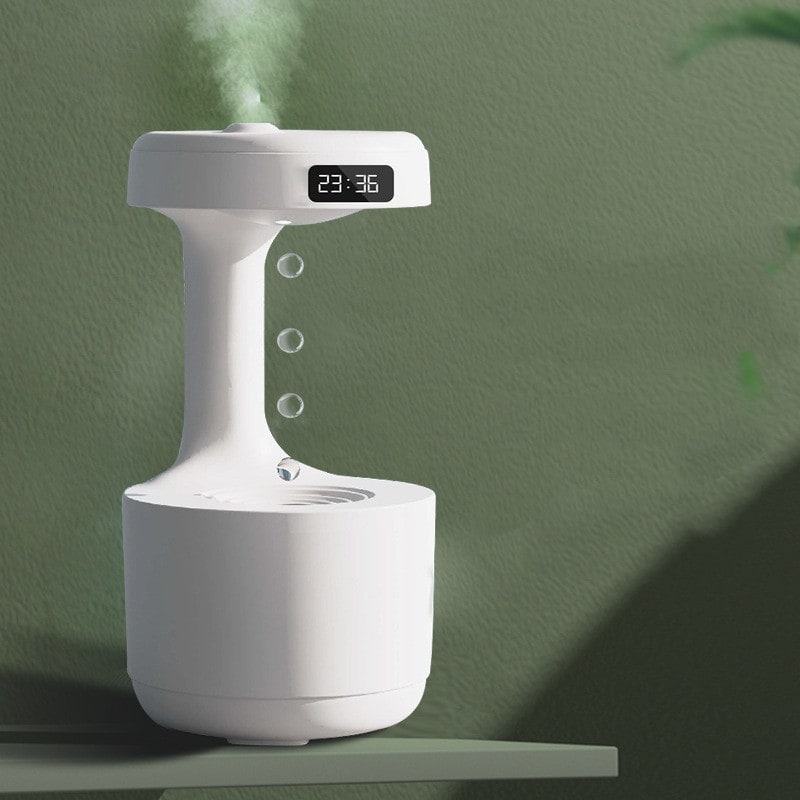 Ultrasonic room humidifier featuring a clear digital clock and soft ambient LED lighting.