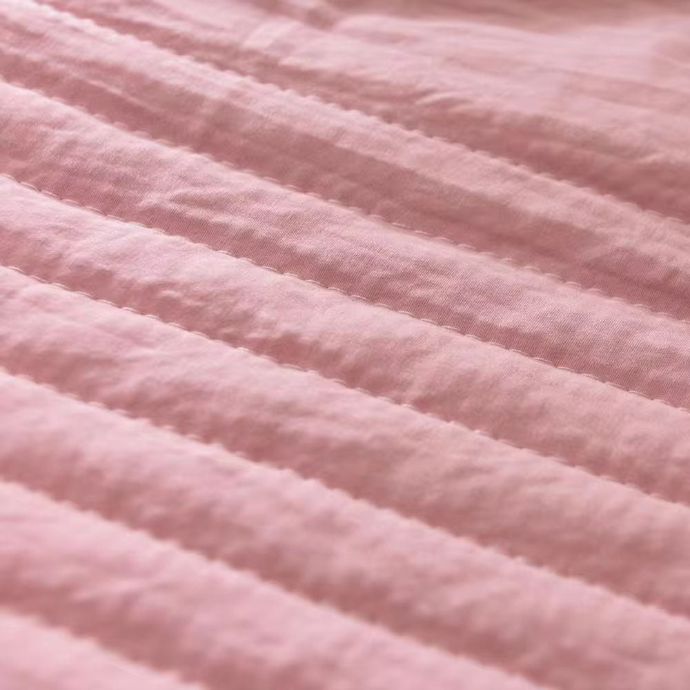 Detail shot of the ultra-soft, breathable fabric of the blue cooling throw blanket for ultimate comfort.
