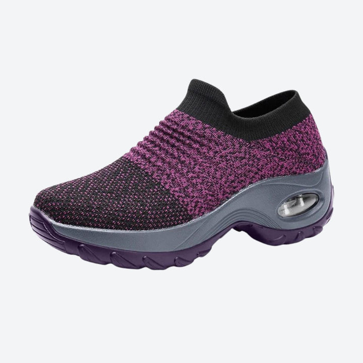 Women's Purple walking sneakers with strong arch support, slip-on design for easy wear.