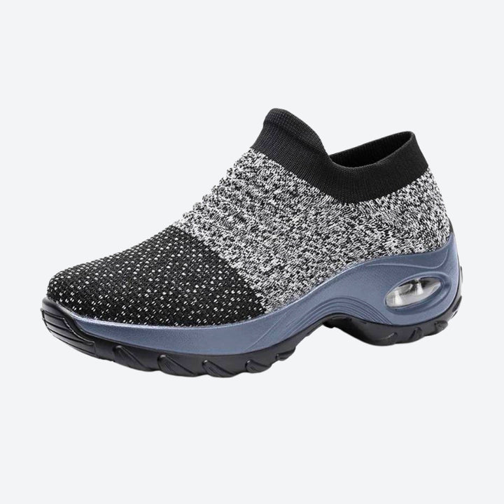 All-day comfort with Black women's slip-on sneakers. Features arch support, perfect for casual walks.