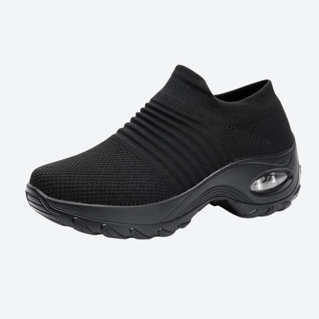 Versatile Grey women's sneakers: slip-on, arch support, air cushion sole for ultimate comfort.