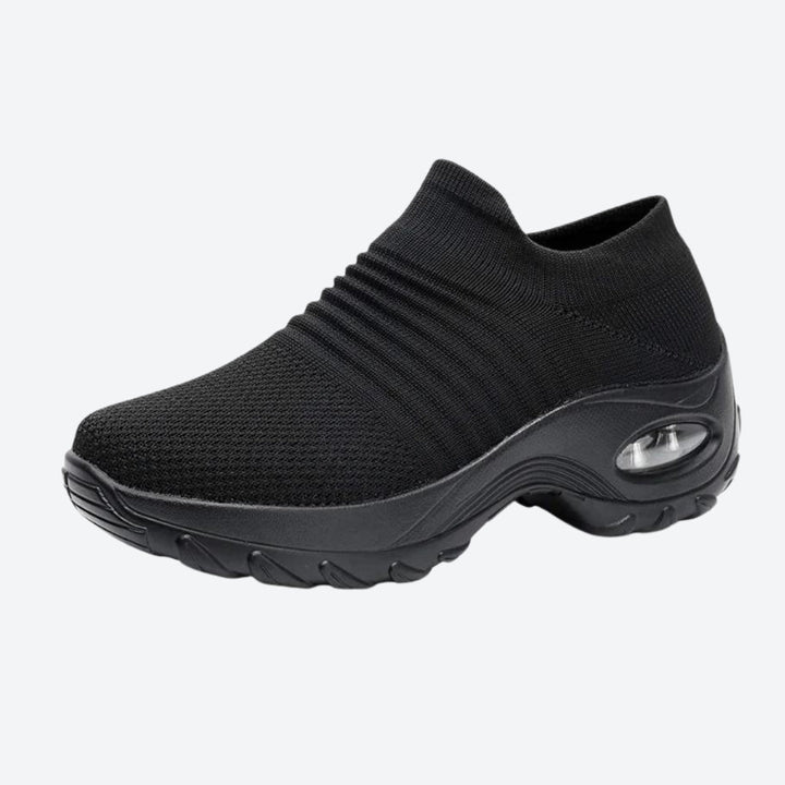 Versatile Grey women's sneakers: slip-on, arch support, air cushion sole for ultimate comfort.