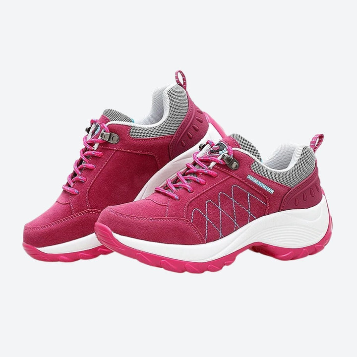 Fashion-forward black women's sneakers, offering arch support & lightweight feel.