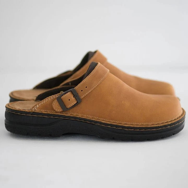 Comfortable men's slip-on orthopedic mules, black, with adjustable buckle for casual wear.