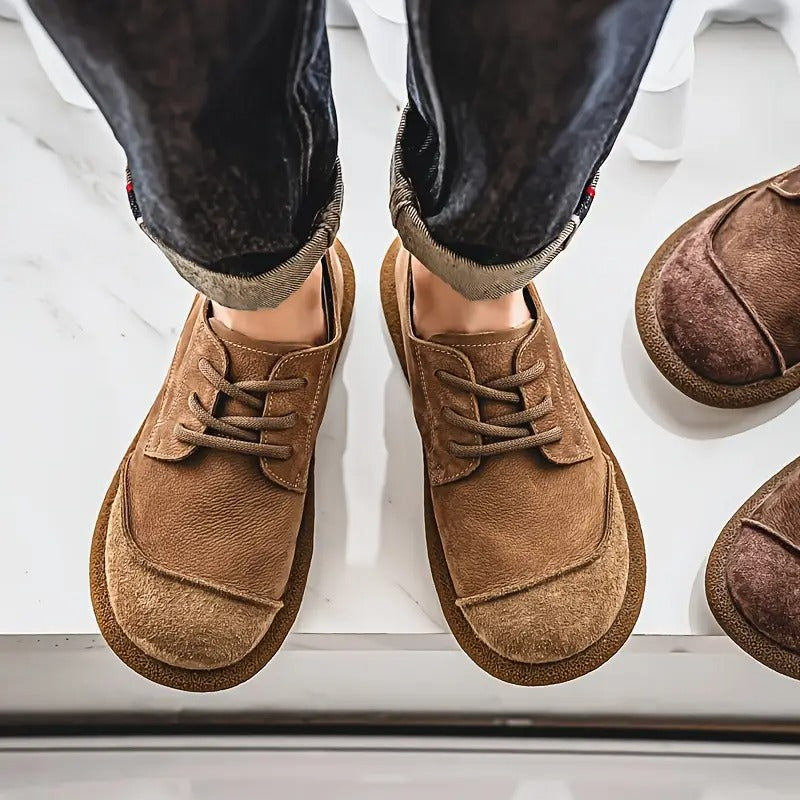 Pair of black men's comfort footwear, orthopedic walking shoes with durable lace-up design & supportive sole.