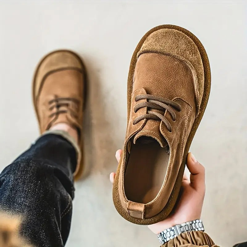 Side view of men's orthopedic walking shoe, classic lace-up design, ideal for comfort and daily walking.