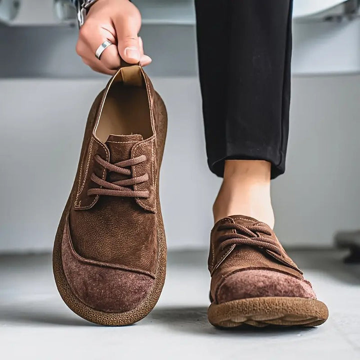 Top-down view of men's classic lace-up orthopedic walking shoes, showcasing comfortable, supportive design.