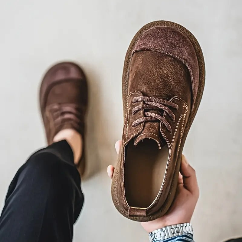 Detail of anti-slip sole on men's orthopedic walking shoes, ensuring stability & foot health with every step.