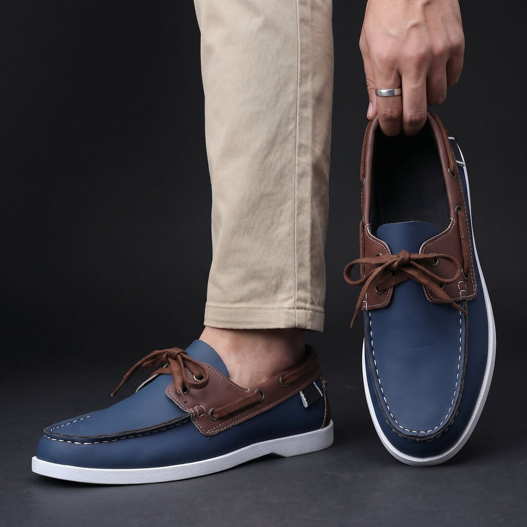 Men's two-tone moc-toe boat shoes, lightweight & relaxed, ideal for summer nautical adventures.