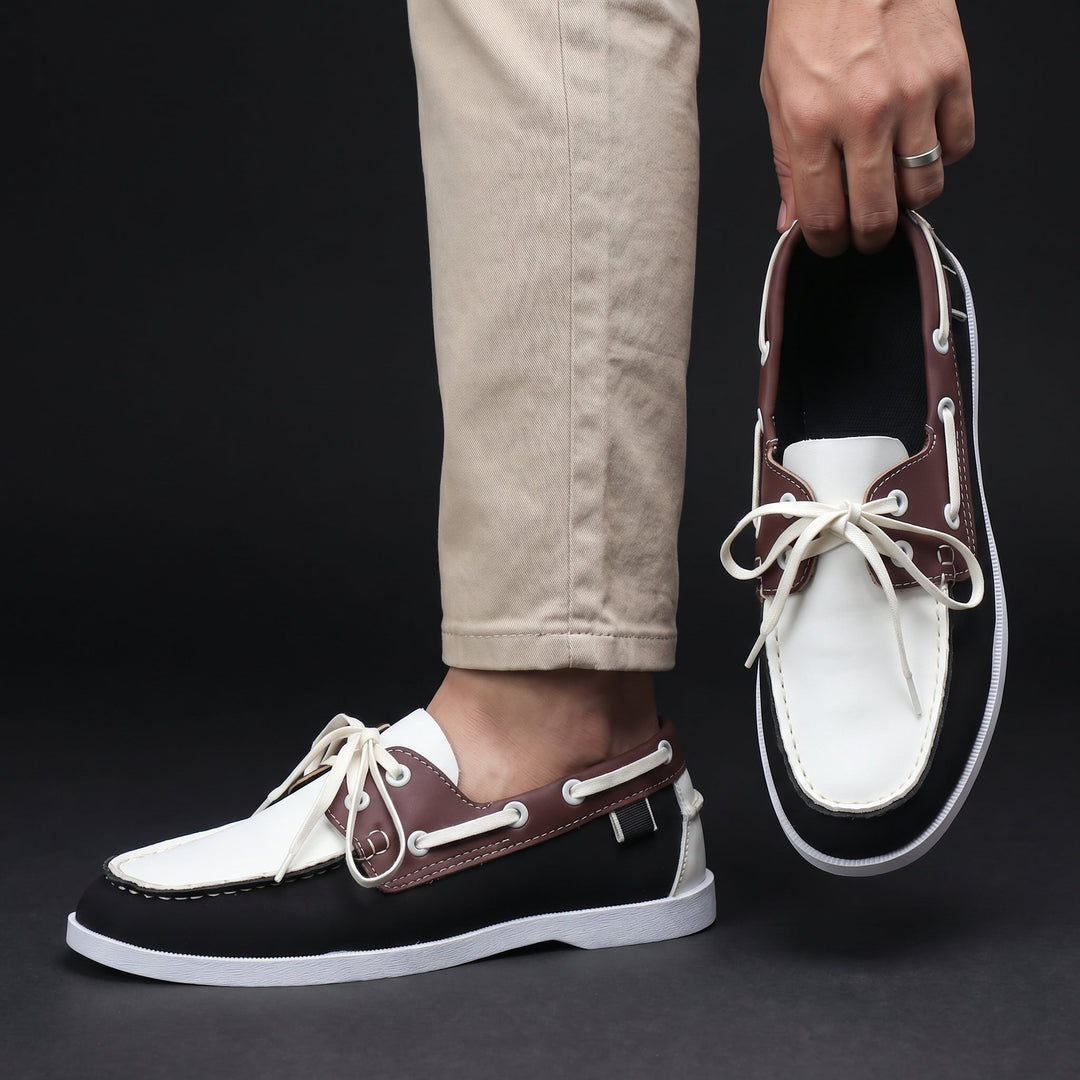 Stylish men's two-tone boat shoes with a classic moc toe design, lightweight & relaxed for summer comfort.
