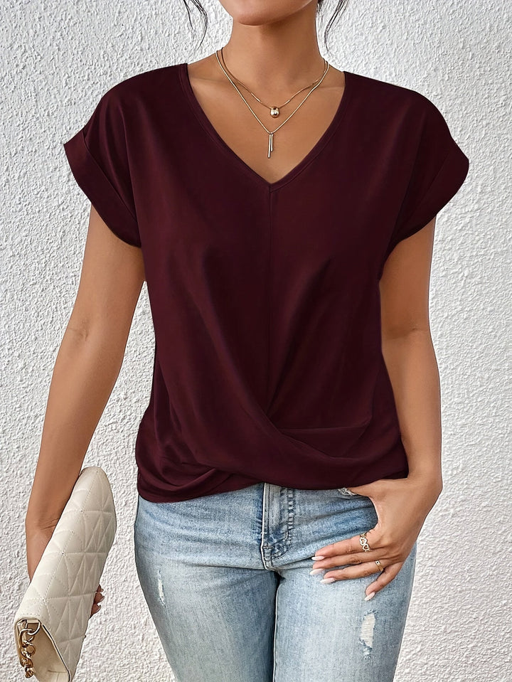 Relaxed fit women's V-neck short sleeve top. Comfortable & chic for any day.