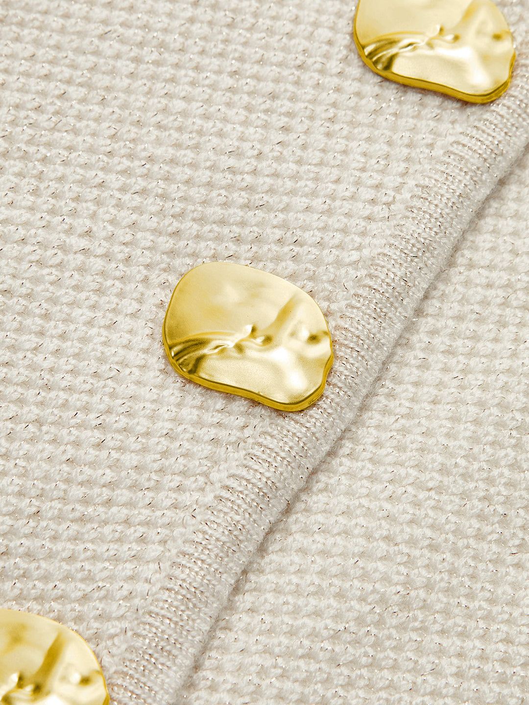 Soft knit women's sleeveless sweater vest, offering comfortable chic layering for fall & winter.