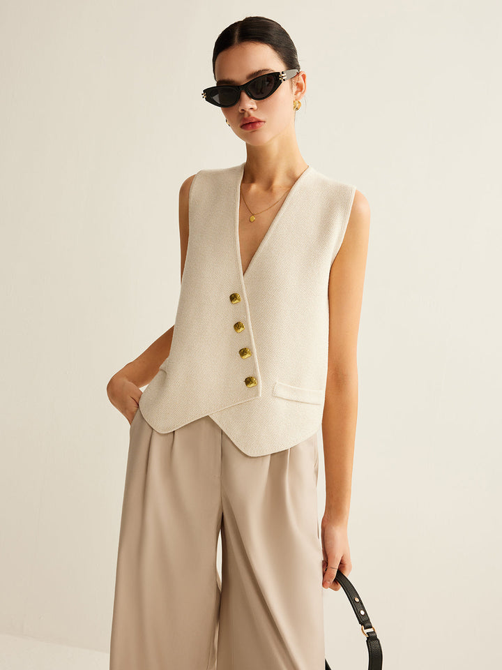 Women's chic sleeveless sweater vest, perfect for layering during fall & winter.