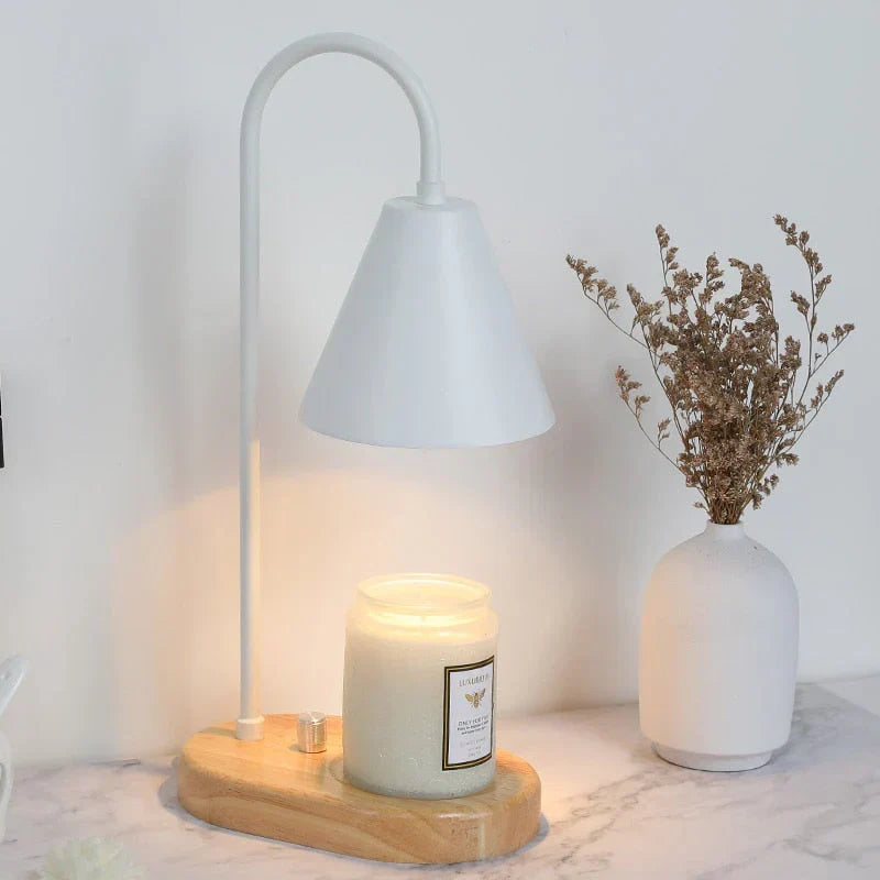 Chic electric candle warmer lamp featuring a wood base & metal design, a flameless aroma diffuser for stylish homes.