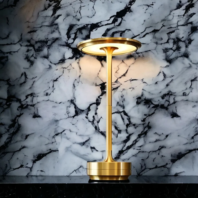 Modern wireless LED table lamp, rechargeable and portable, creating a warm, elegant atmosphere.