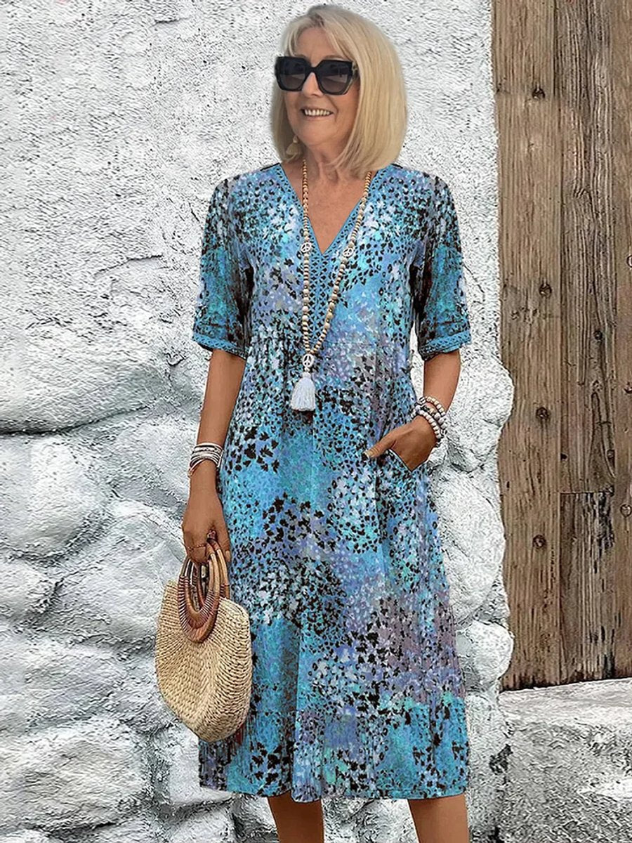 Comfortable women's floral V-neck midi casual dress, ideal for vacation, spring, or summer outings.
