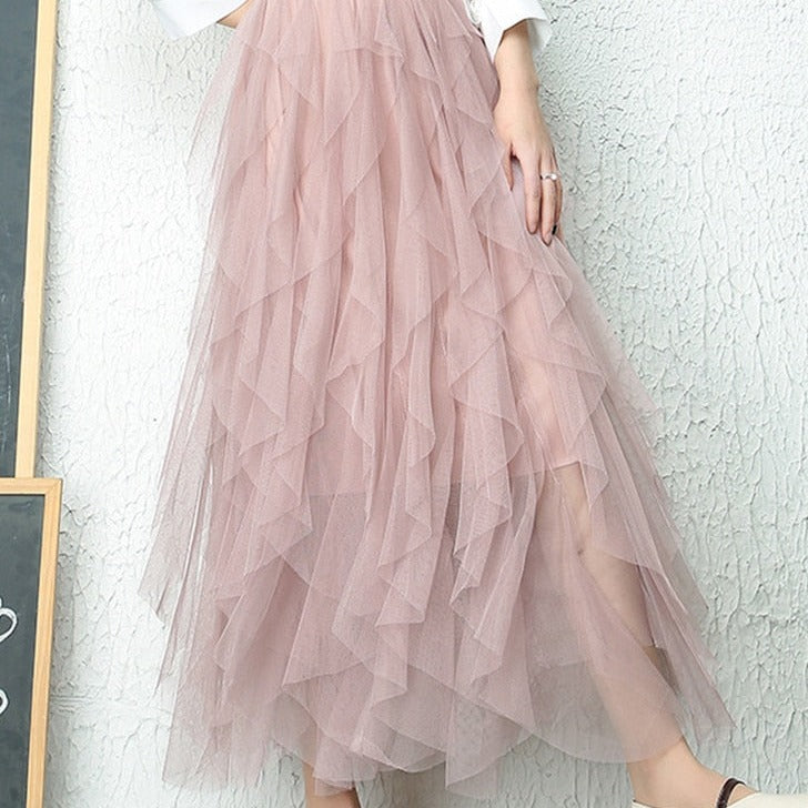 Women's elegant midi skirt, a high-waisted tiered design with a beautiful flow.