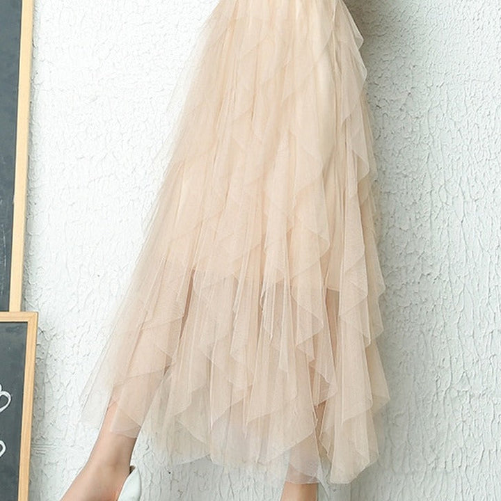 Flowy A-line midi skirt for women, featuring graceful tiers and a flattering high waist.