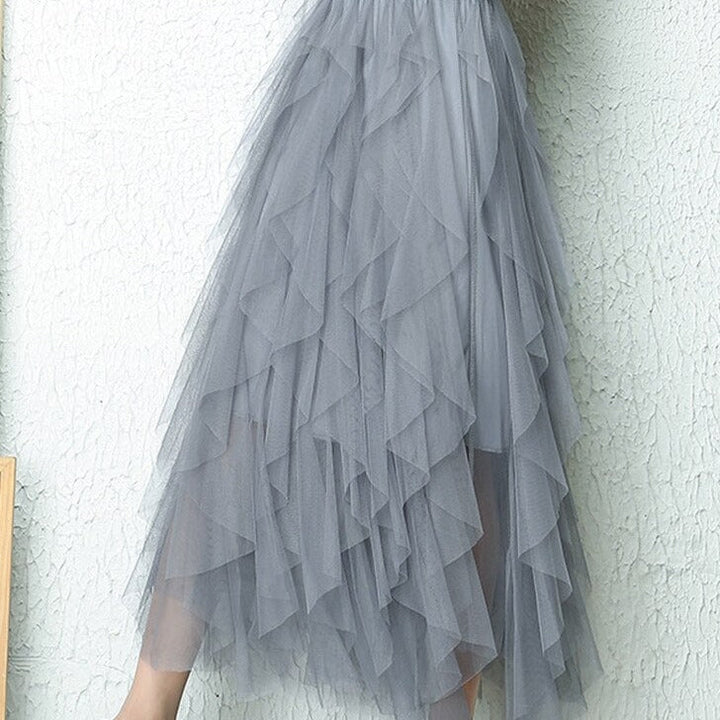 Stylish tiered A-line midi skirt for women, high-waisted, for a chic and modern look.