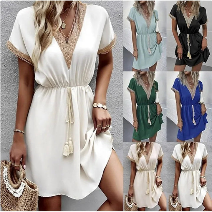 Trendy women's summer dress: boho V-neck design, delicate crochet trim, flutter sleeves & a comfortable knee length.