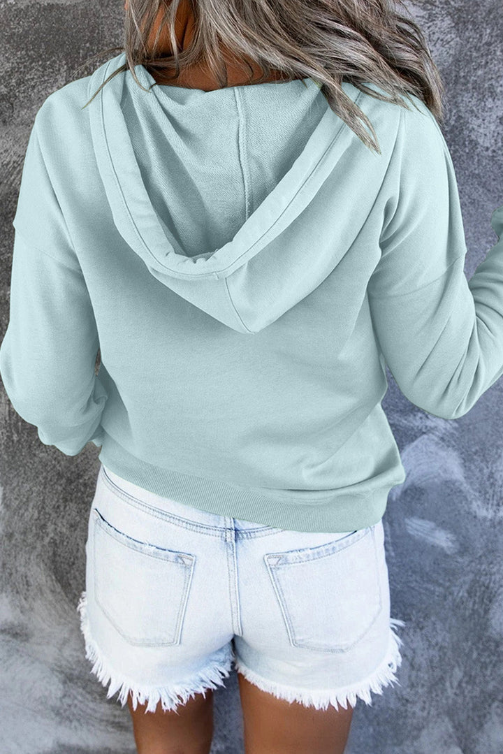 Relaxed fit women's hooded sweater, great for everyday comfort and laid-back fashion.
