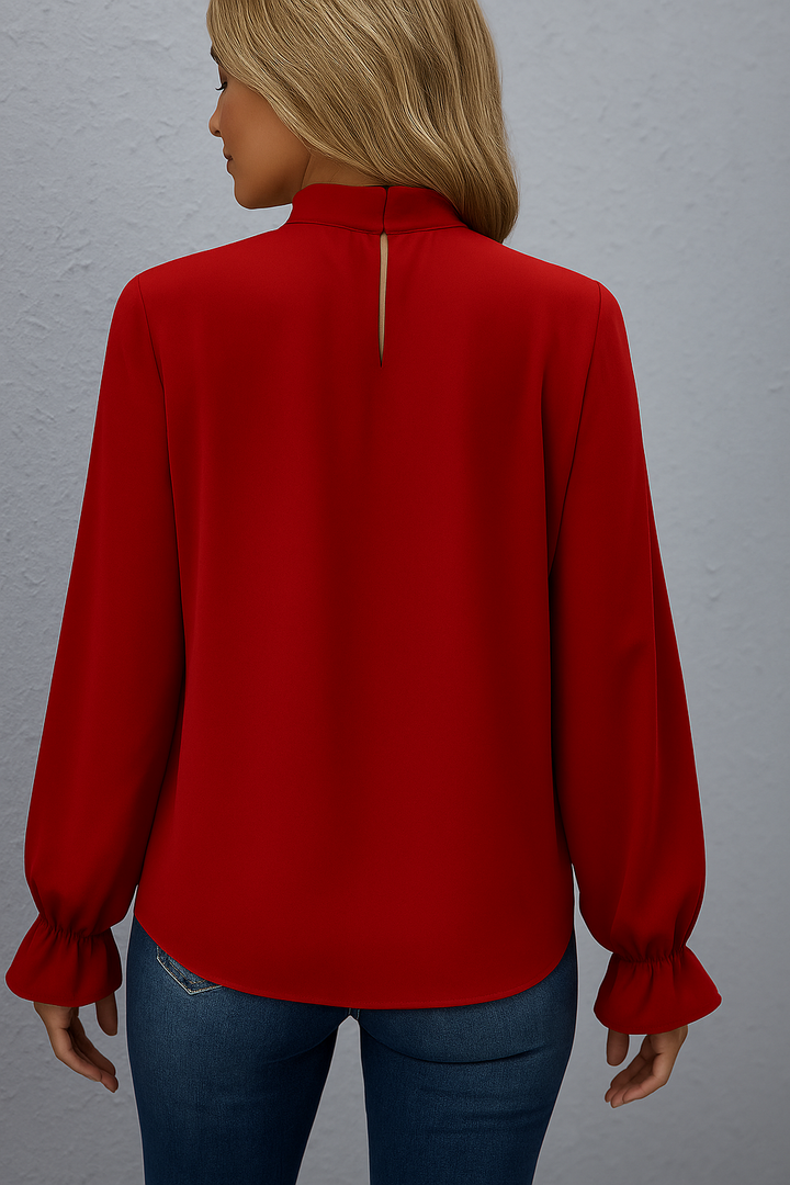 Stylish red long sleeve tie-neck blouse for women. Elegant fashion top, ideal for office or casual chic.