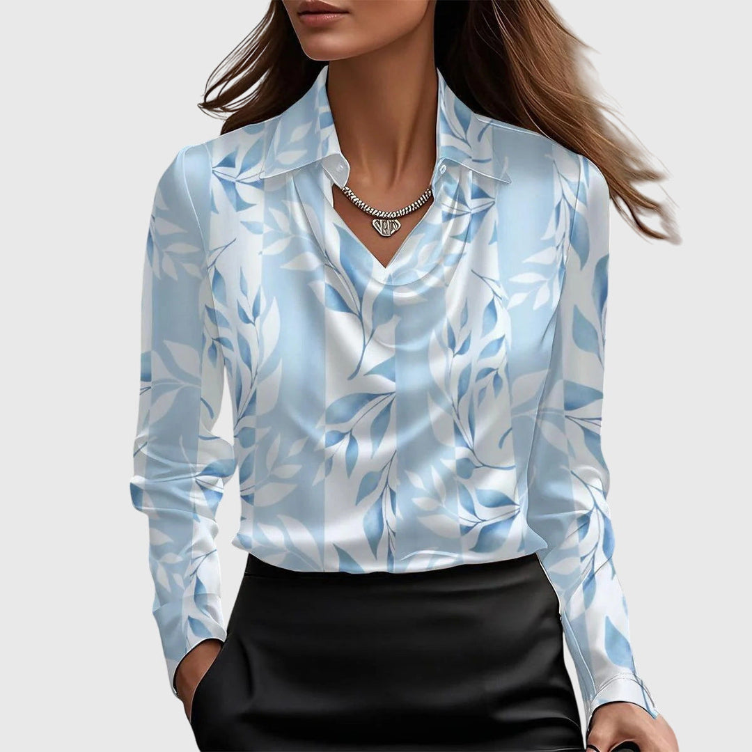 Versatile women's elegant blouse top with a classic pleated neckline, ideal for formal or everyday style.