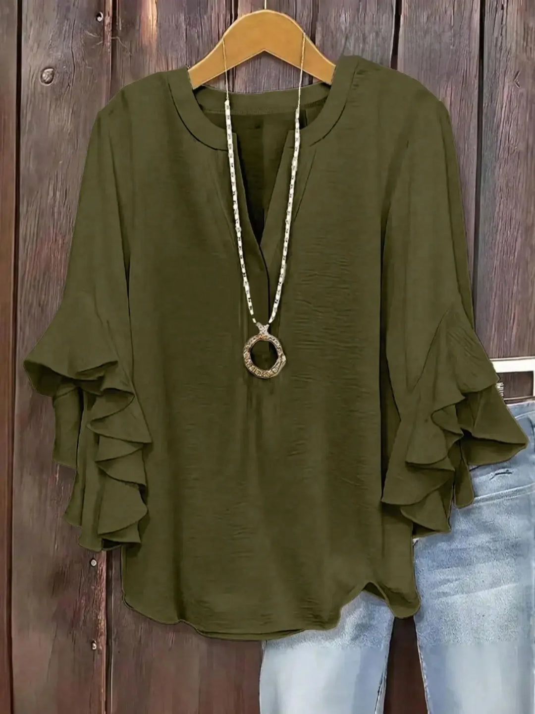 Comfortable V-neck short sleeve blouse, a versatile women's top for casual wear.