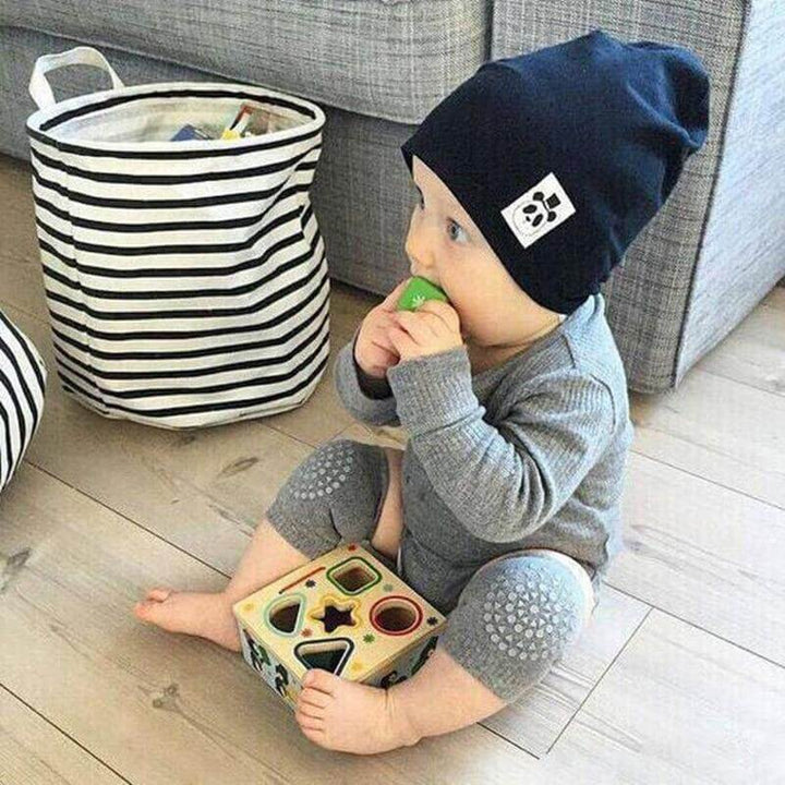 Comfortable non-slip crawling pads providing superior protection for baby's knees during playtime.