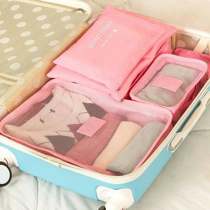 Space-saving luggage organizer set with mesh panels for easy travel packing.