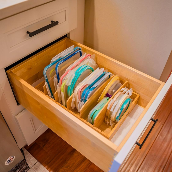 Space-saving bamboo pot lid holder, adjustable for various lid sizes. Perfect for kitchen cabinet organization.