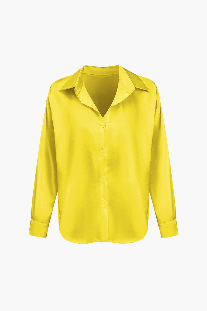 Office-ready women's long-sleeve button-down blouse, a versatile work top.