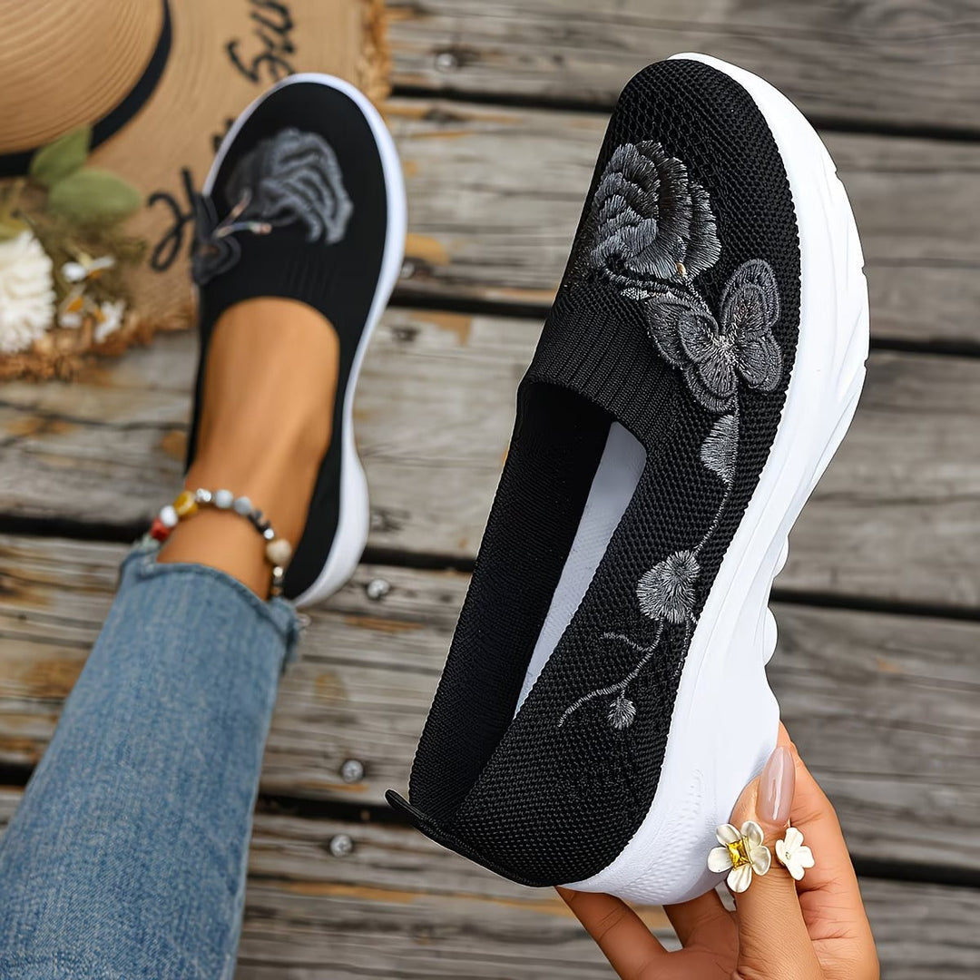 Easy slip-on women's knit trainers, perfect for quick casual wear & walking comfort.