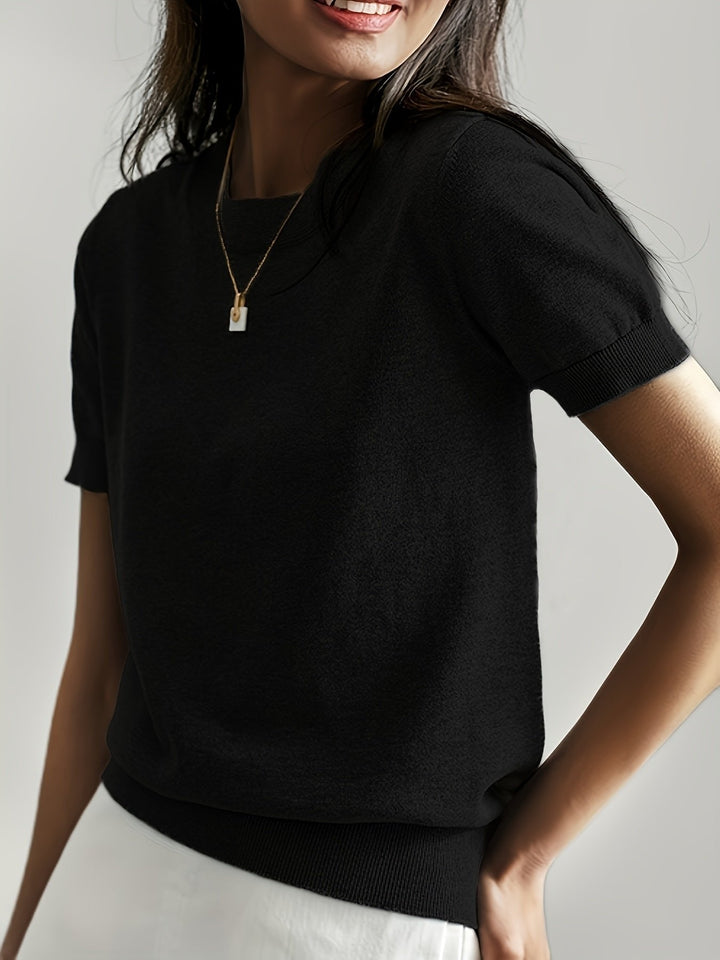 Stylish short-sleeve women's top with a comfortable relaxed fit, ideal for versatile everyday fashion.