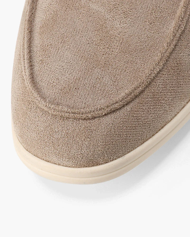 Stylish men's beige slip-on moccasins, designed for ultimate comfort & easy wear. A versatile fashion choice.